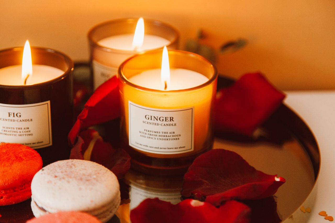 about-me-02 Warm and cozy setup with scented candles and rose petals for a romantic ambiance.